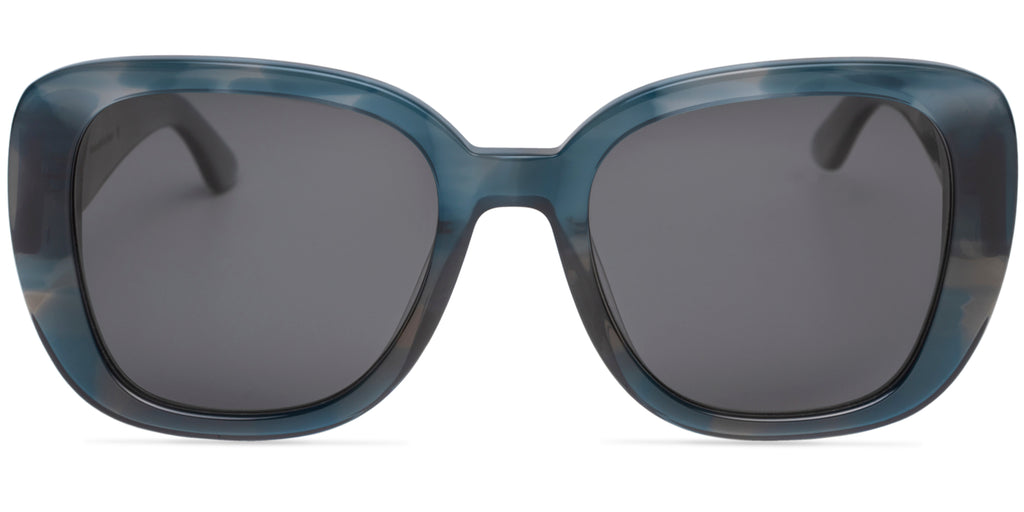 Sunglasses with blue tortoise shell frame and dark lenses on a white background