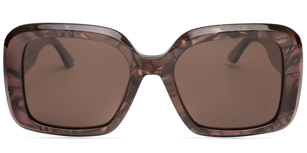 Sunglasses with a tortoiseshell frame and dark lenses on a white background