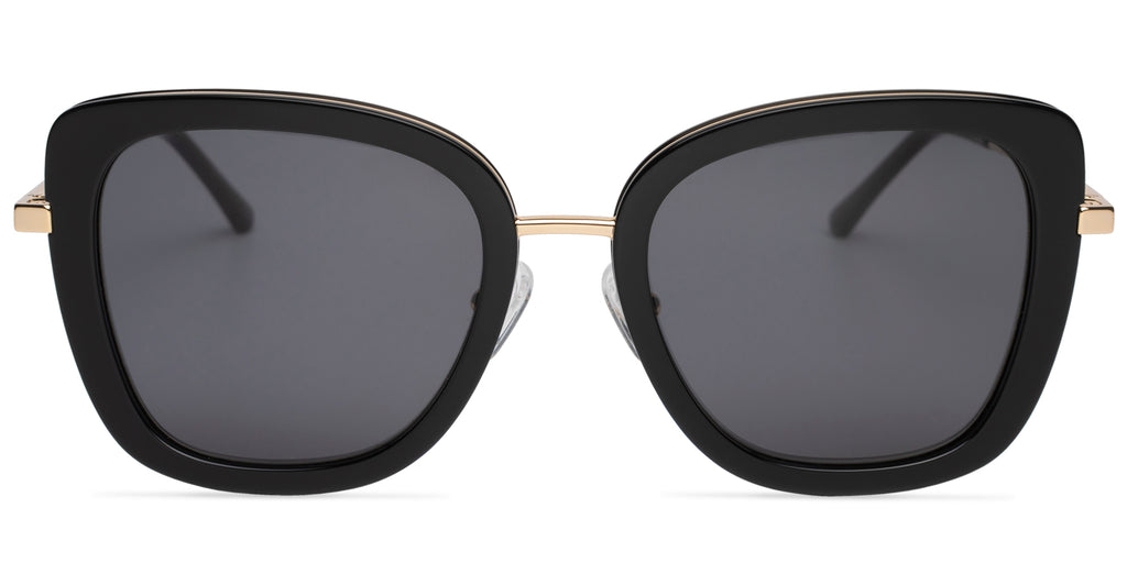 Black sunglasses with gold accents on a white background