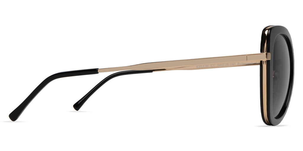 Sunglasses with black frame and dark lenses on a white background side view