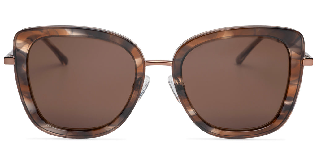 Sunglasses with tortoiseshell frame and brown lenses on a white background