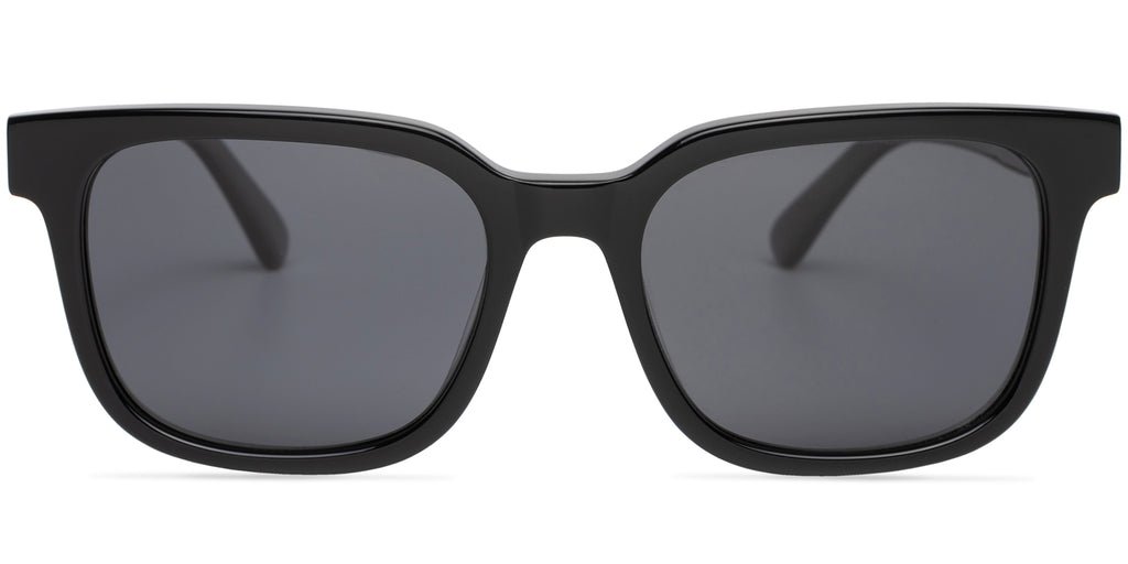 Black sunglasses with dark lenses on a white background