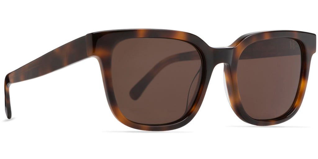 Sunglasses with tortoiseshell frame and dark lenses on a white background (frame and temple view)