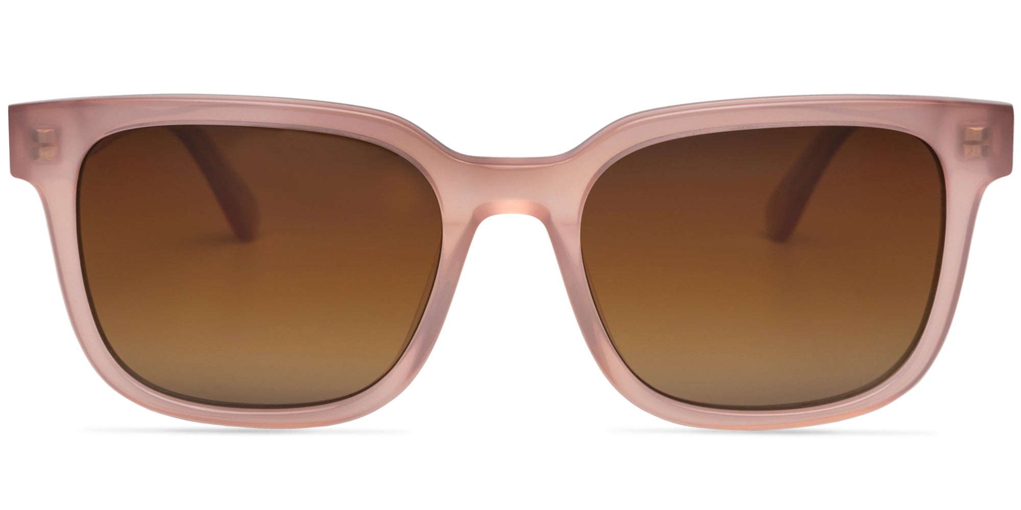 Sunglasses with a milky pink frame and brown lenses on a white background